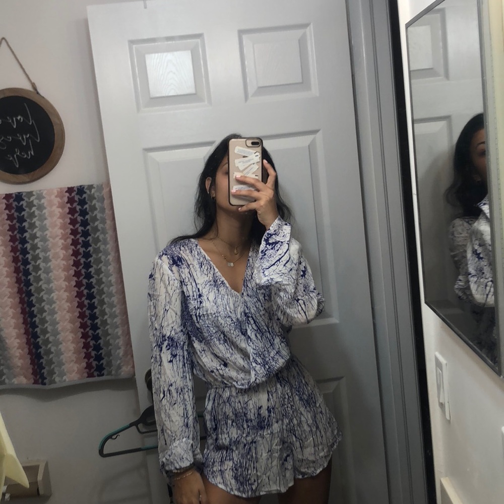 Blue and white long sleeve romper w bell sleeves